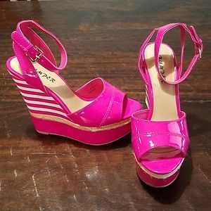 Hot pink patent platforms